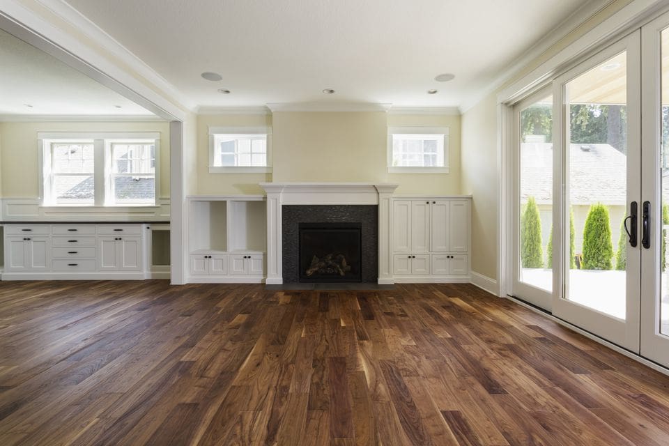 Fireplace area with hardwood flooring