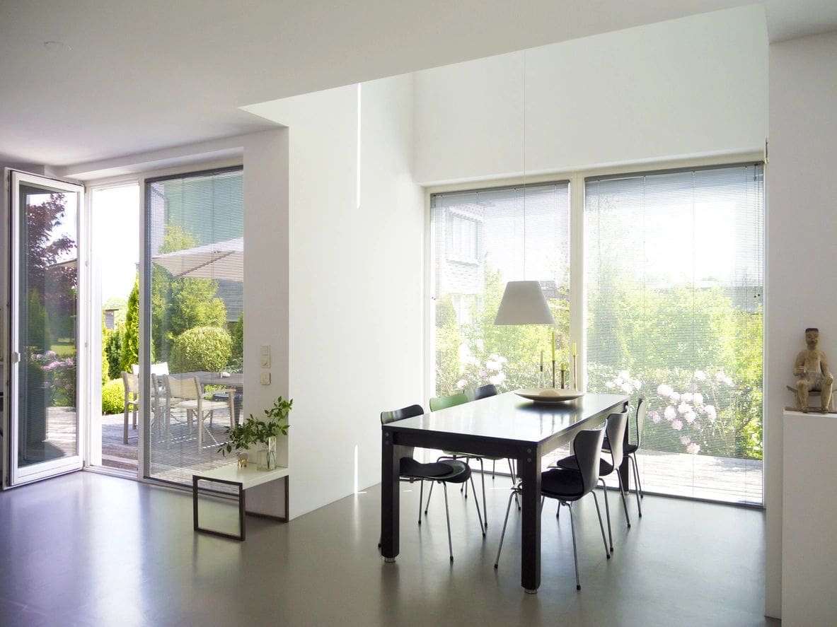 modern dining room interior with view to garden